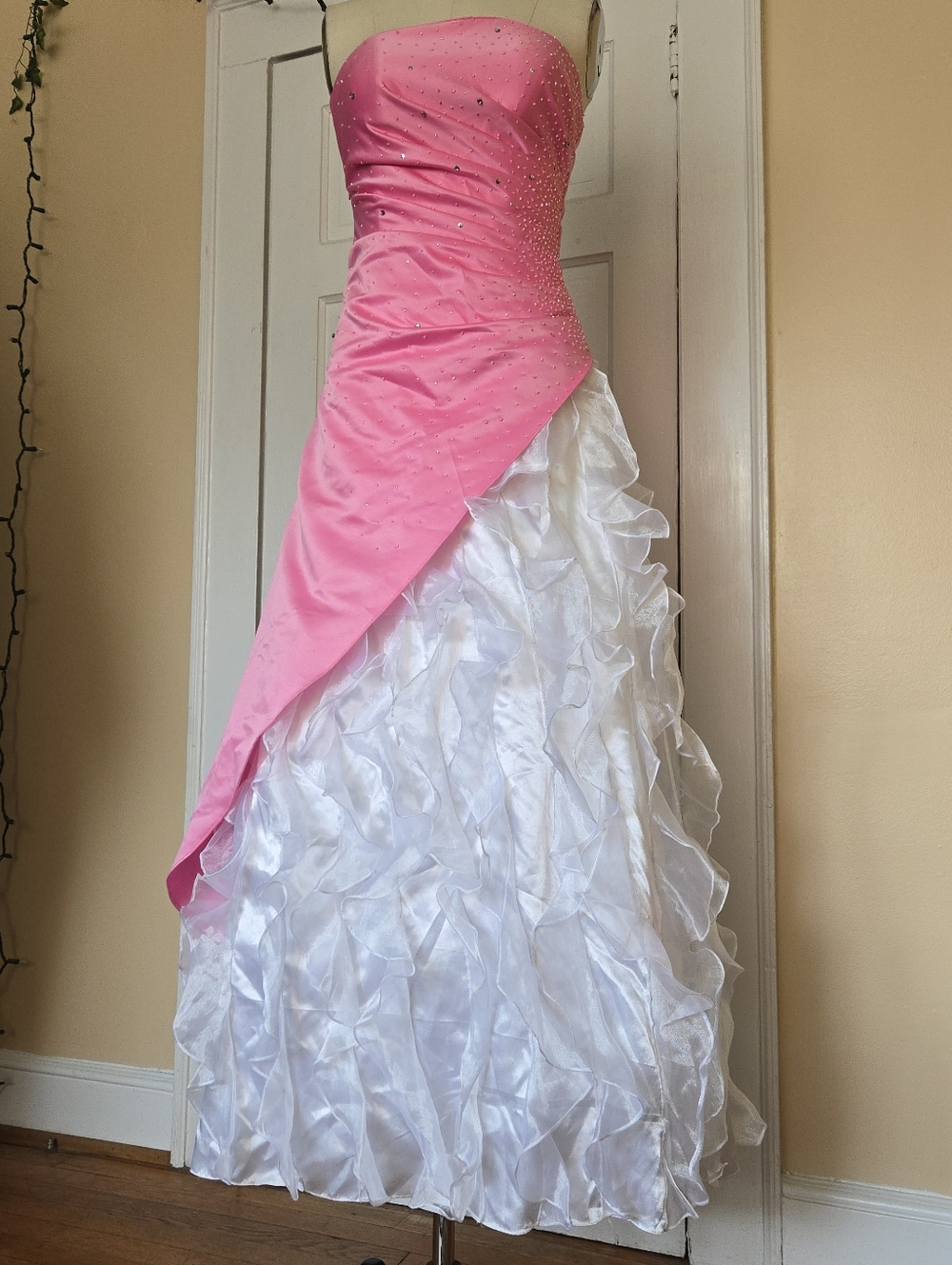 Pink and white strapless prom dress with rhinestones, ruffled skirt
